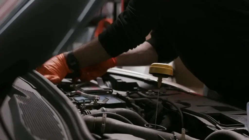 Mechanic working in an engine bay